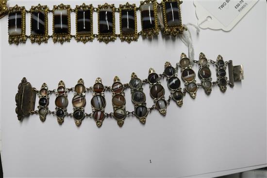 Two banded agate bracelets, one in gilt metal, one in white metal.